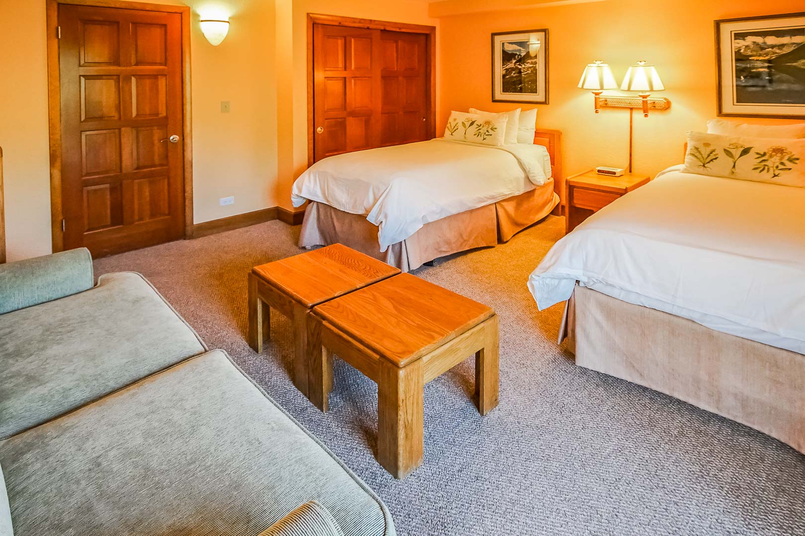 A spacious bedroom with double beds at VRI's Cedar at Streamside in Colorado.